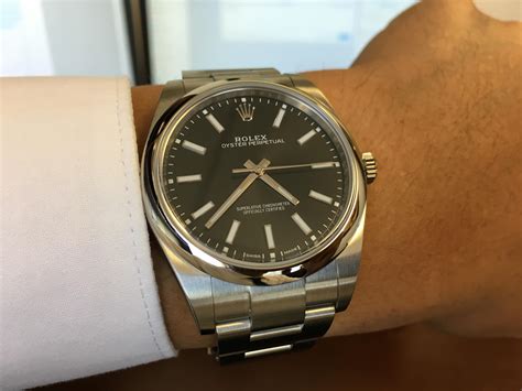 rolex oyster perpetual black on hand|Rolex Oyster Perpetual prix.